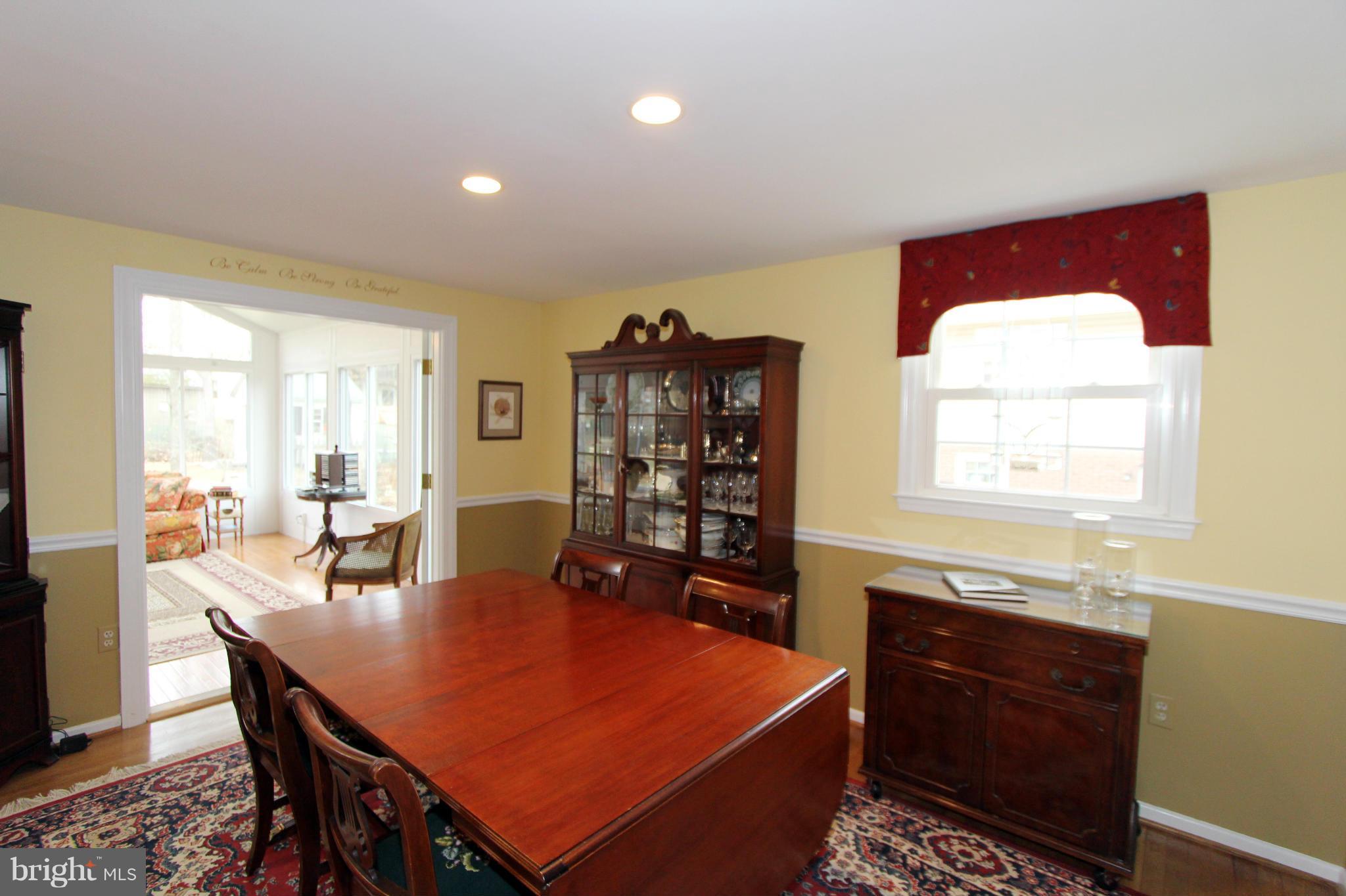 2000 Byrd Road Vienna, VA 22182 - Photo 11 of 30 a dining room with a table and chairs