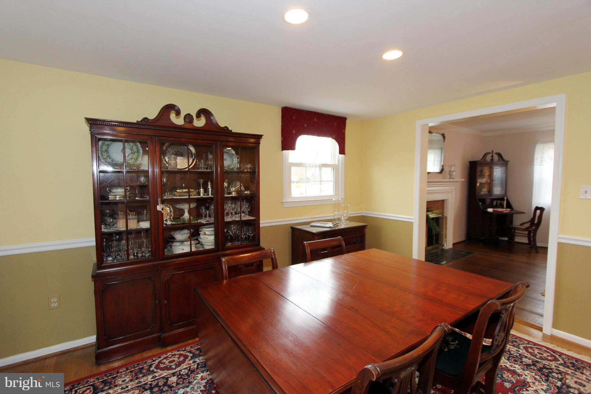 2000 Byrd Road Vienna, VA 22182 - Photo 12 of 30 a dinning room with furniture and wooden floor