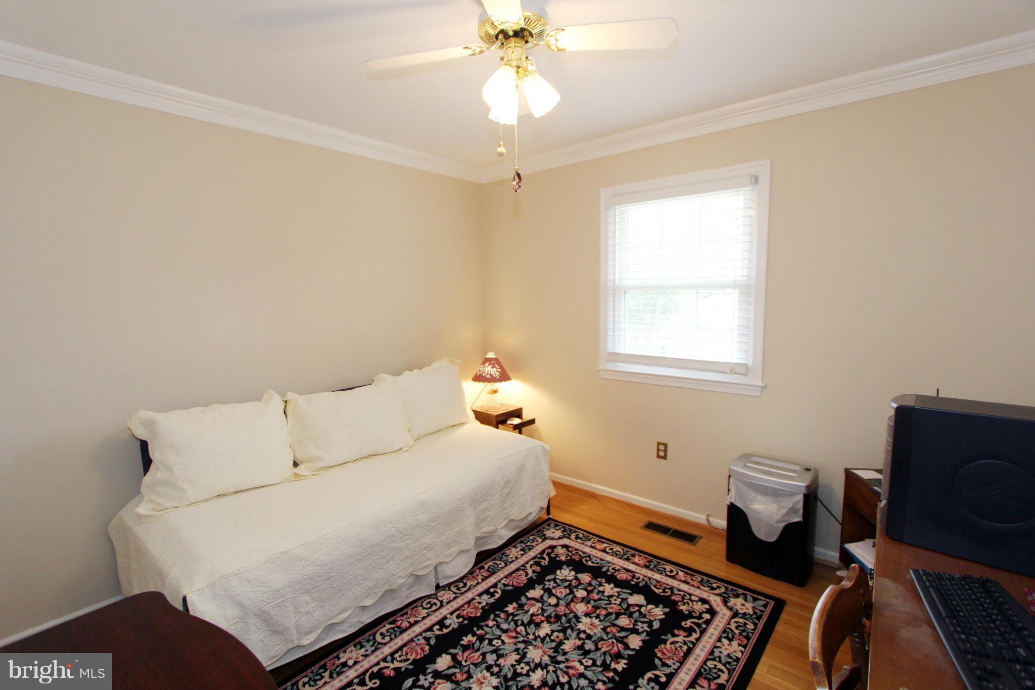 2000 Byrd Road Vienna, VA 22182 - Photo 25 of 30 a bedroom with a bed and a window