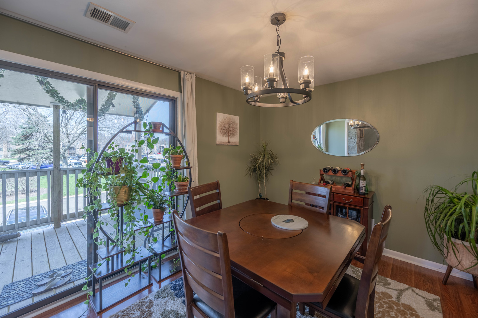 1495 South County Farm Road, Unit 23 Wheaton, IL 60189 - Photo 14 of 21 a view of a dining room with furniture window and outside view