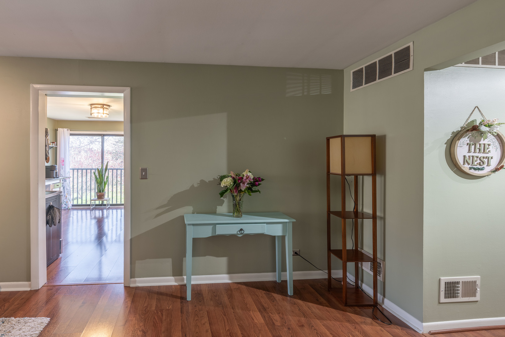 1495 South County Farm Road, Unit 23 Wheaton, IL 60189 - Photo 3 of 21 a workspace with wooden floor