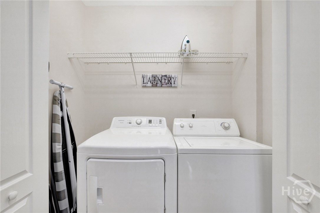 214 Butler Avenue, Unit 204 Tybee Island, GA 31328 - Photo 29 of 41 Laundry is in the back hall