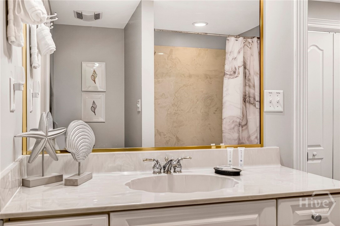 214 Butler Avenue, Unit 204 Tybee Island, GA 31328 - Photo 37 of 62 guest bath