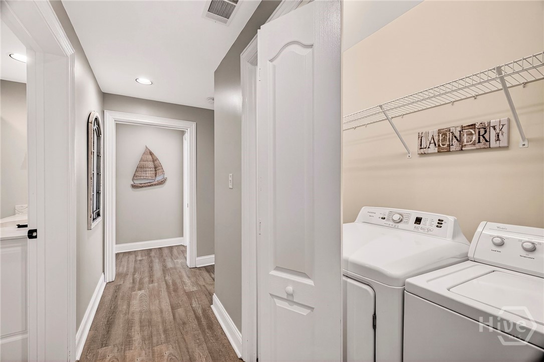 214 Butler Avenue, Unit 204 Tybee Island, GA 31328 - Photo 47 of 62 rear hall with laundry closet