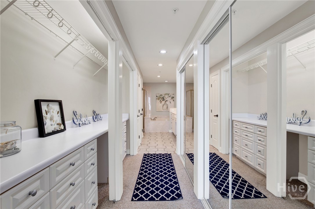 214 Butler Avenue, Unit 204 Tybee Island, GA 31328 - Photo 9 of 41 huge closet and primary bath