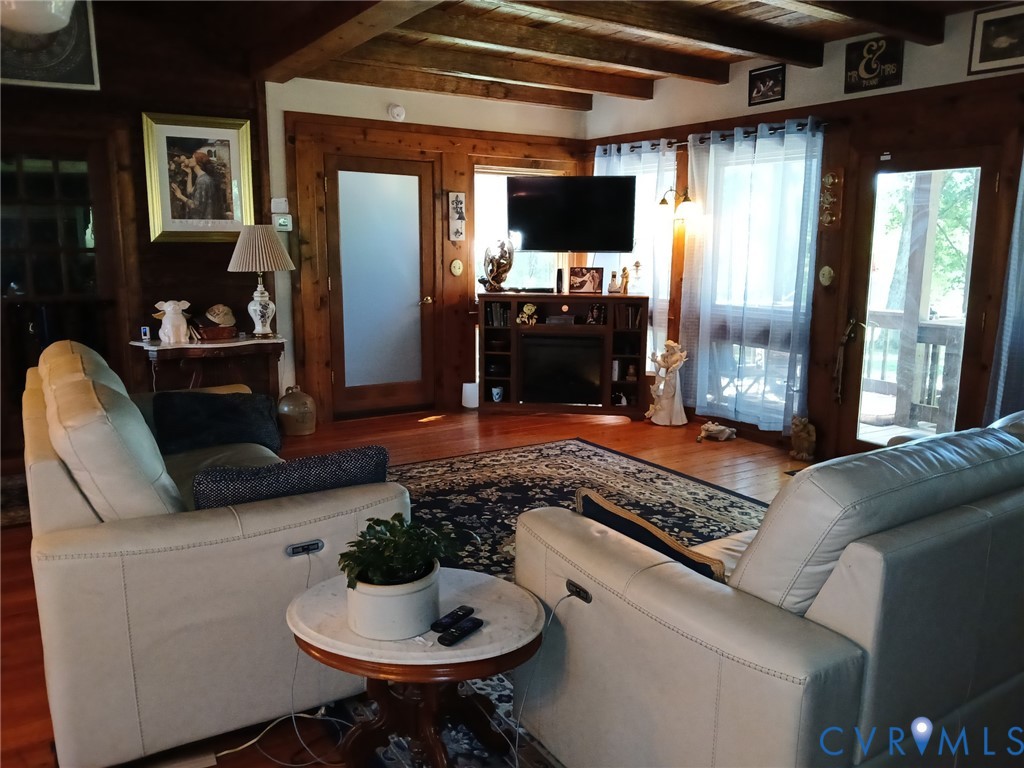 2174 Grubby Road Halifax, VA 24558 - Photo 12 of 25 a living room with furniture and a flat screen tv