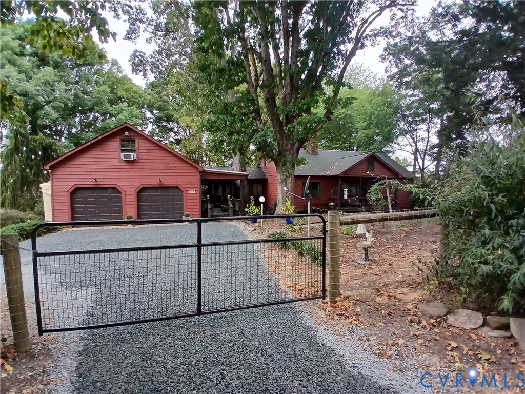 2174 Grubby Road Halifax, VA 24558 - Photo 2 of 25 a front view of house with yard and trees in the background