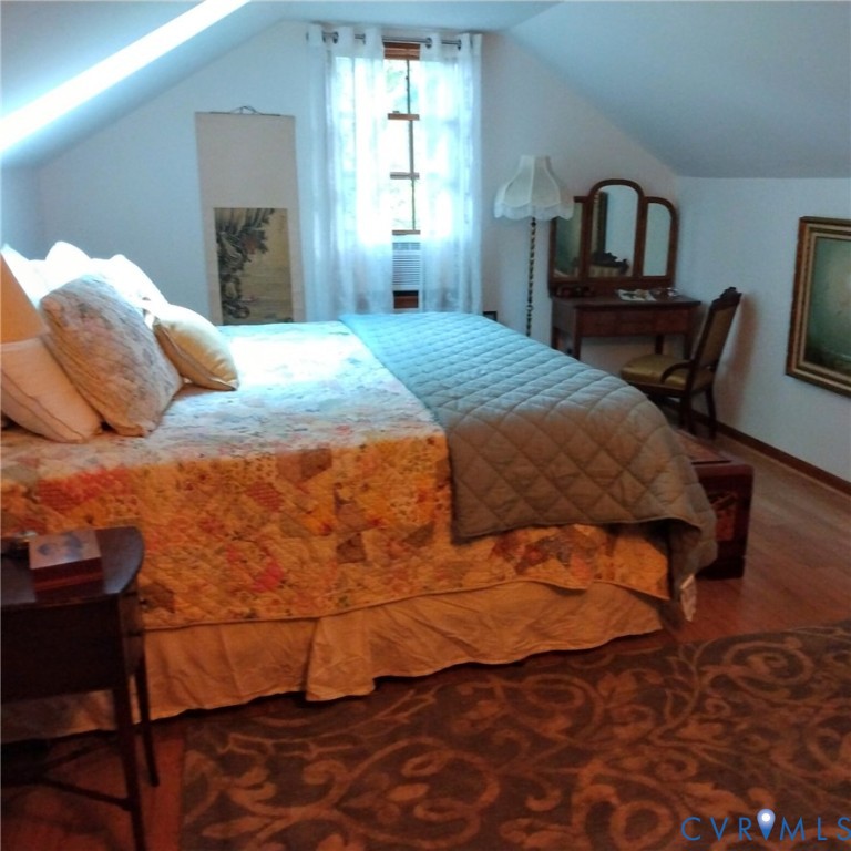 2174 Grubby Road Halifax, VA 24558 - Photo 21 of 25 a bedroom with a bed and wooden floor