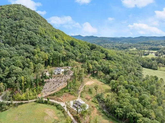 a view of a kitchen with refrigerator and washer