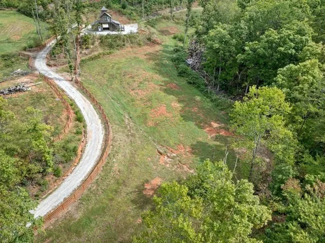a view of a road with a yard