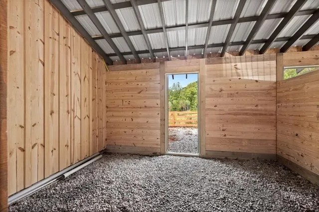 a view of a kitchen with refrigerator and washer