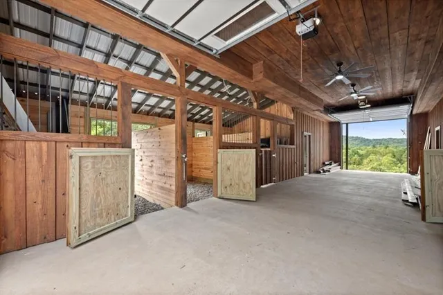 a view of outdoor space with trees all around