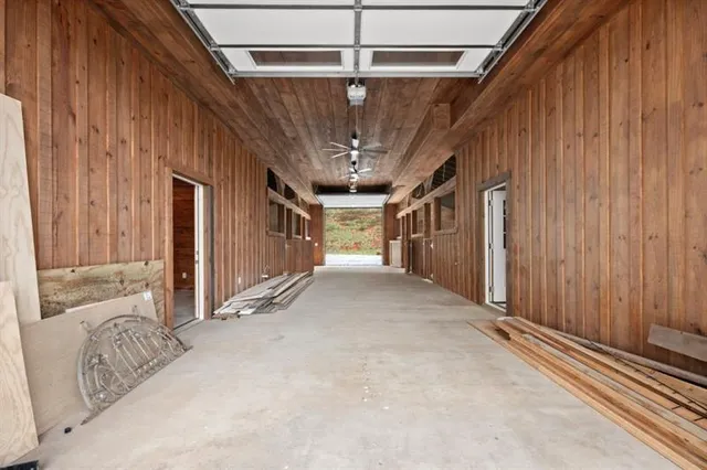 a view of a balcony with wooden fence