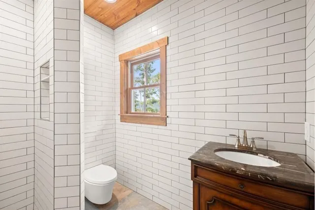 a view of kitchen with furniture and large window