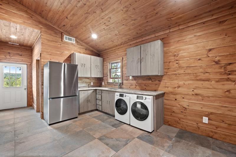 144 David Drive Tiger, GA 30576 - Photo 39 of 71 a kitchen with stainless steel appliances granite countertop a stove a refrigerator and a microwave