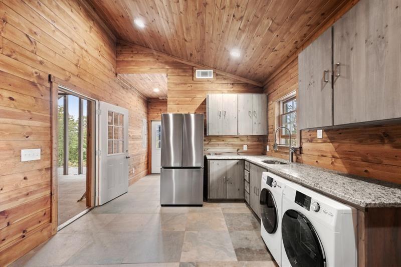 144 David Drive Tiger, GA 30576 - Photo 41 of 71 a view of a kitchen with refrigerator and washer