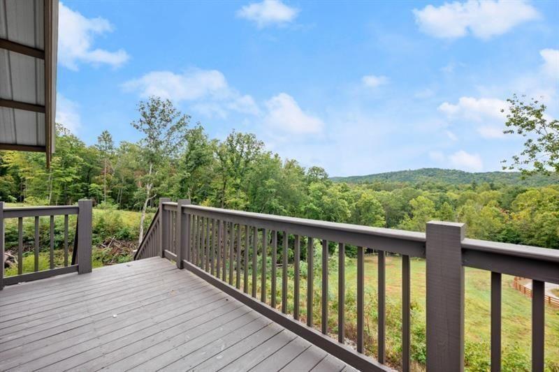 144 David Drive Tiger, GA 30576 - Photo 49 of 71 a balcony with wooden floor and fence