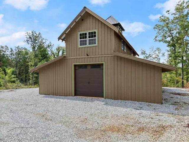 a view of a yard with trees