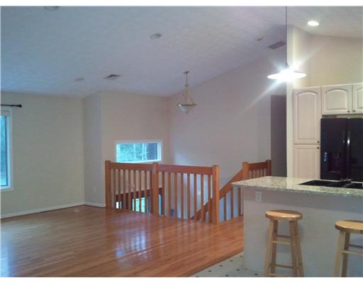 5656 Flat River Road Coventry, RI 02827 - Photo 11 of 19 Living Room. Georgous oak railings