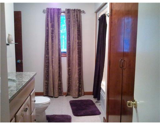 5656 Flat River Road Coventry, RI 02827 - Photo 18 of 19 Master Bath/Spa. Master bath is a pullman bath with new granite counter, maple white pickled cabnitry and expanded linen closet for plenty of storage.
