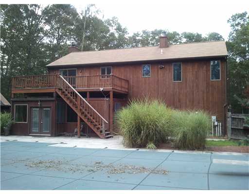 5656 Flat River Road Coventry, RI 02827 - Photo 3 of 19 Exterior Back. Amazing Deck