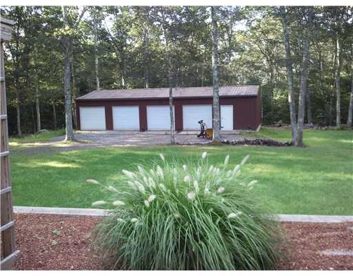 5656 Flat River Road Coventry, RI 02827 - Photo 5 of 19 Exterior Back. awesome 4 car heated garage, totally fenced 2.6 acres