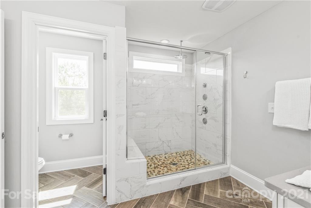 2701 Walker Road Matthews, NC 28105 - Photo 15 of 32 a bathroom with a shower
