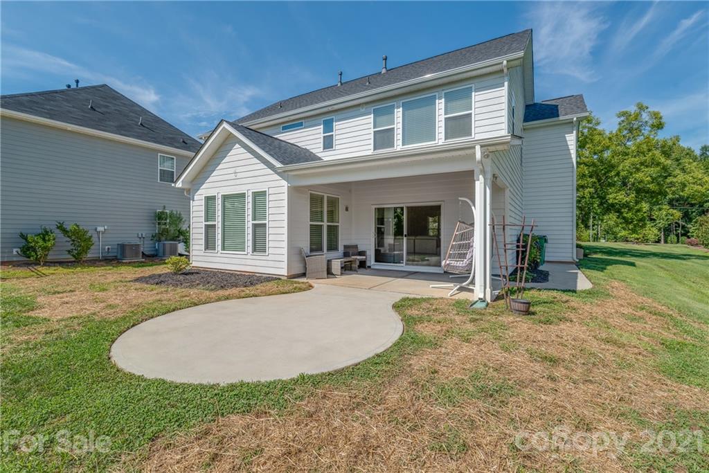 2701 Walker Road Matthews, NC 28105 - Photo 27 of 32 a view of a house with backyard and sitting area