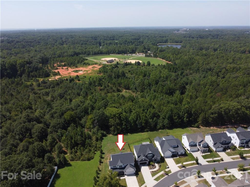 2701 Walker Road Matthews, NC 28105 - Photo 31 of 32 an aerial view of a house with a yard