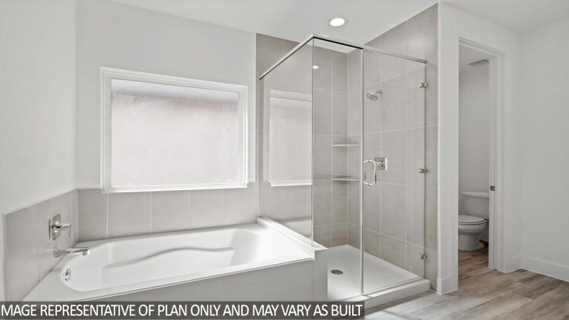 15219 Riverside Drive Baytown, TX 77523 - Photo 6 of 14 a bathroom with a tub shower and sink