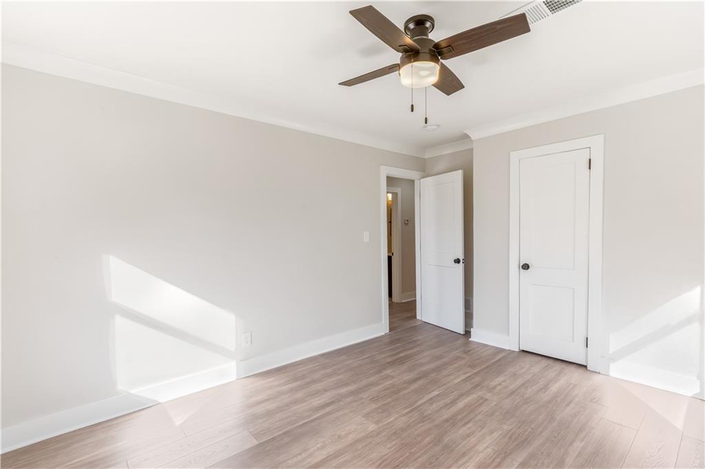 2260 Old Spring Road Smyrna, GA 30080 - Photo 23 of 29 wooden floor in an empty room