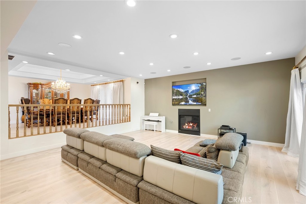 3331 Oakmont View Drive Glendale, CA 91208 - Photo 13 of 50 a living room with furniture and a fireplace