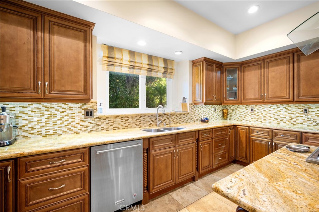3331 Oakmont View Drive Glendale, CA 91208 - Photo 19 of 50 a kitchen with a sink and cabinets