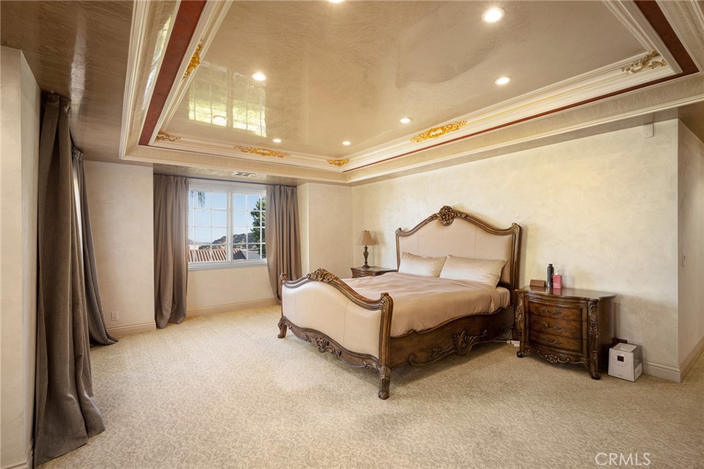 3331 Oakmont View Drive Glendale, CA 91208 - Photo 25 of 50 a spacious bedroom with a bed and a window