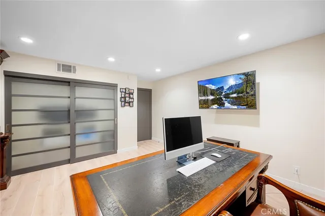 a view of a workspace with furniture