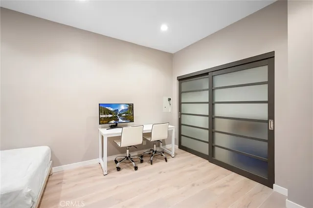 a workspace with furniture and a window