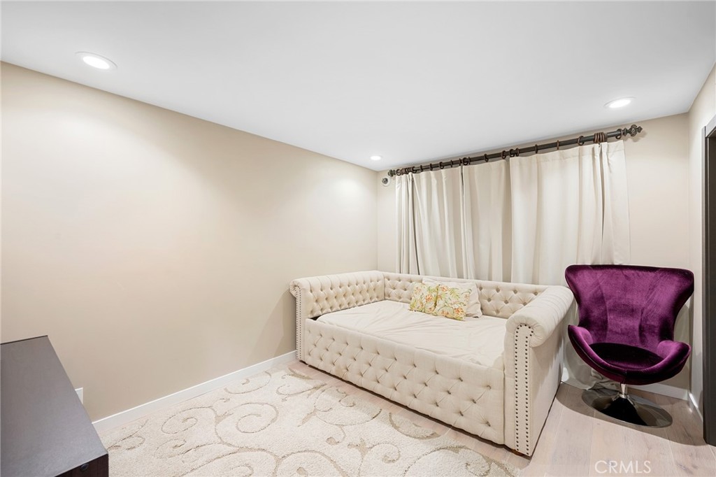 3331 Oakmont View Drive Glendale, CA 91208 - Photo 43 of 50 a bedroom with a bed and a chair