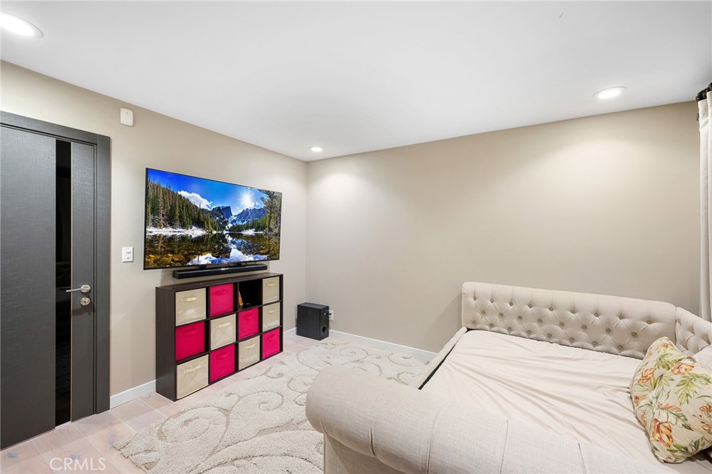 3331 Oakmont View Drive Glendale, CA 91208 - Photo 44 of 50 a bedroom with a bed and a flat screen tv