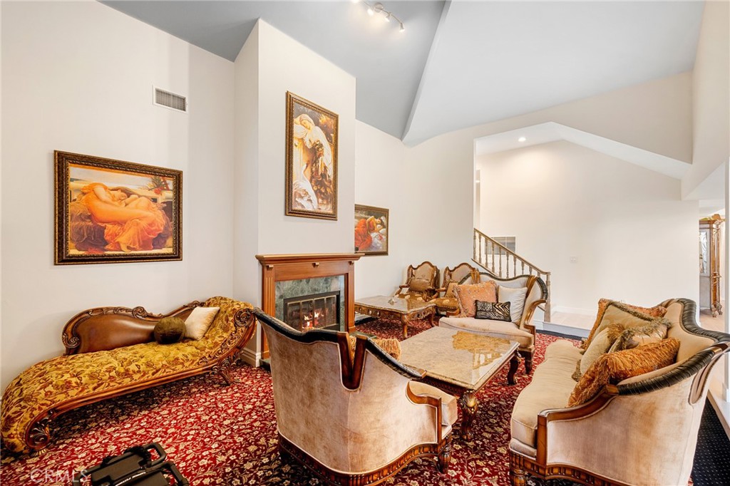 3331 Oakmont View Drive Glendale, CA 91208 - Photo 7 of 50 a living room with furniture and wooden floor