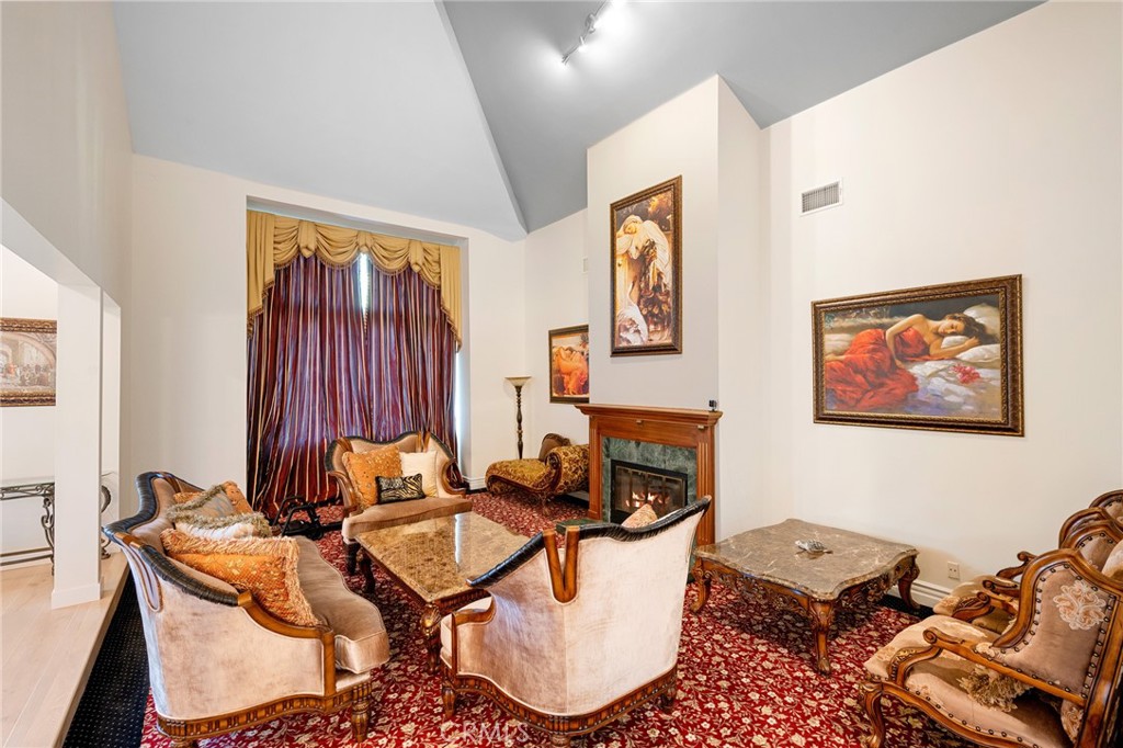 3331 Oakmont View Drive Glendale, CA 91208 - Photo 8 of 50 a room with furniture a rug and a window