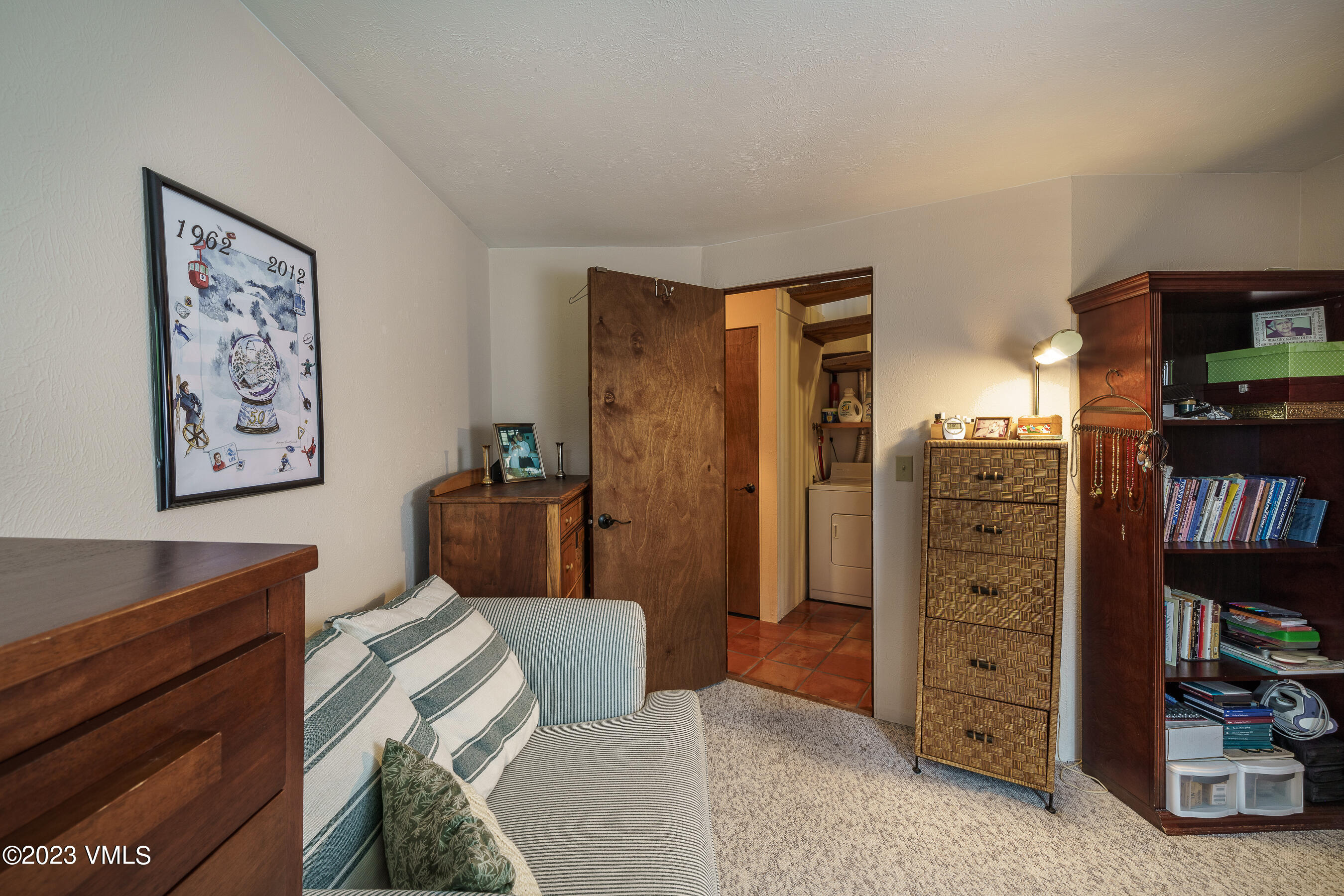 1400 Lions Ridge Loop, Unit A2 Vail, CO 81657 - Photo 16 of 38 a living room with furniture and a walk in closet