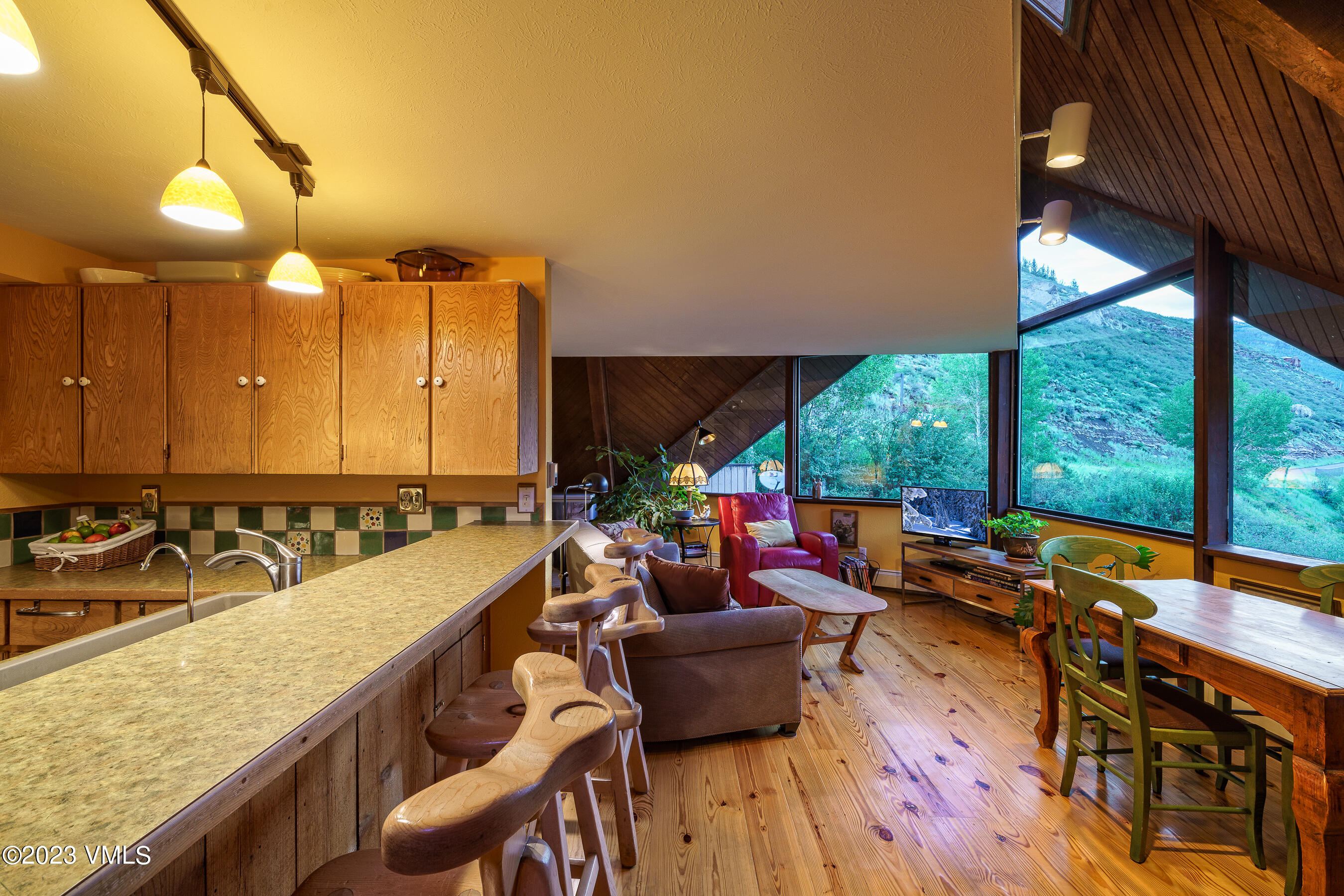 1400 Lions Ridge Loop, Unit A2 Vail, CO 81657 - Photo 31 of 38 a view of a large kitchen with swimming pool and sitting area