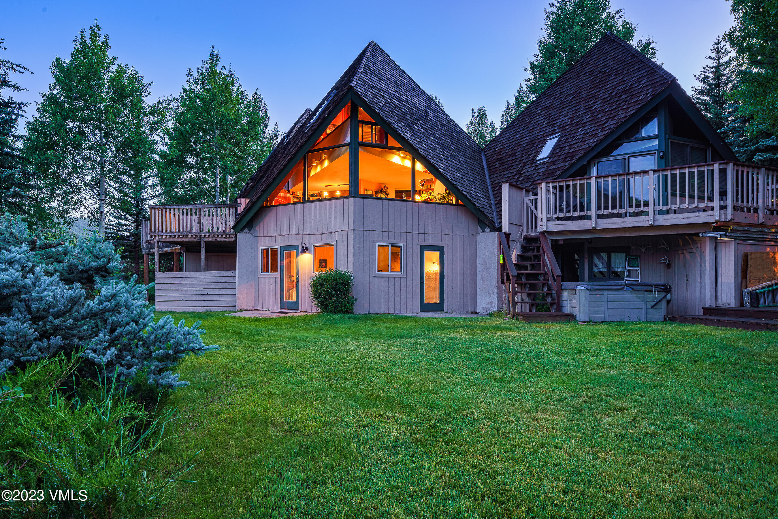 1400 Lions Ridge Loop, Unit A2 Vail, CO 81657 - Photo 35 of 38 a front view of a house with garden