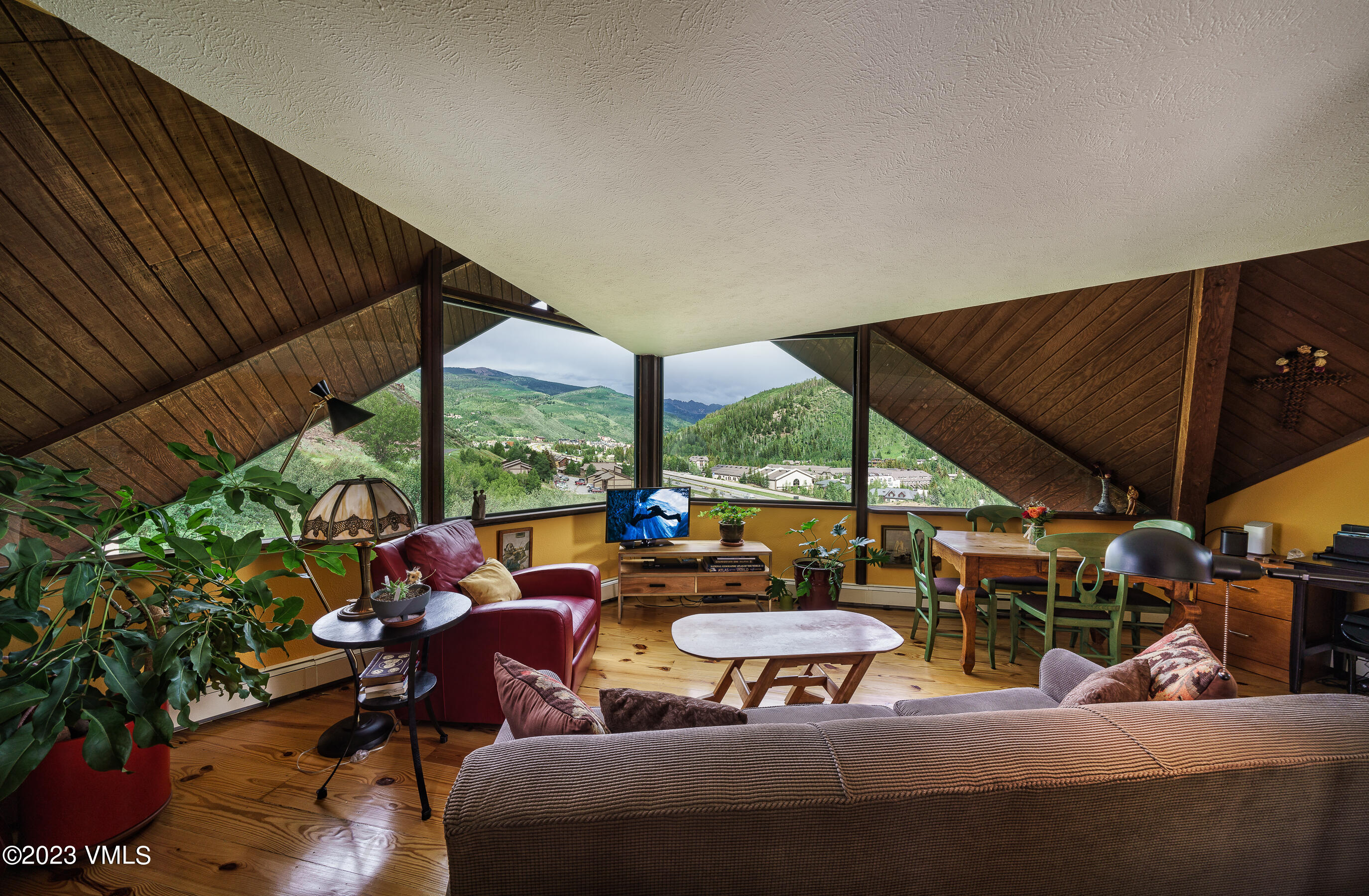 1400 Lions Ridge Loop, Unit A2 Vail, CO 81657 - Photo 5 of 38 a outdoor space with furniture and garden view