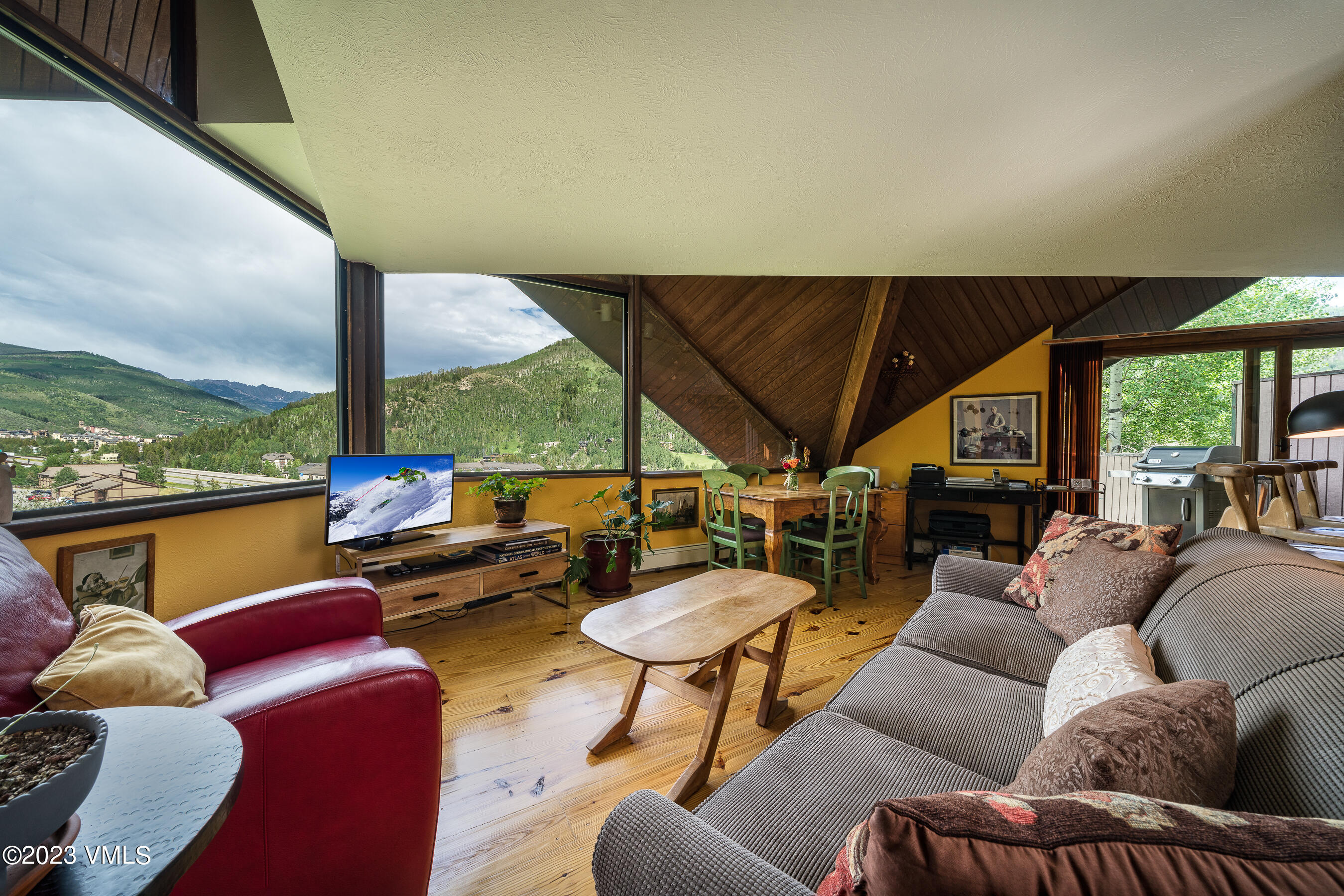 1400 Lions Ridge Loop, Unit A2 Vail, CO 81657 - Photo 6 of 38 a outdoor living space with furniture and garden view
