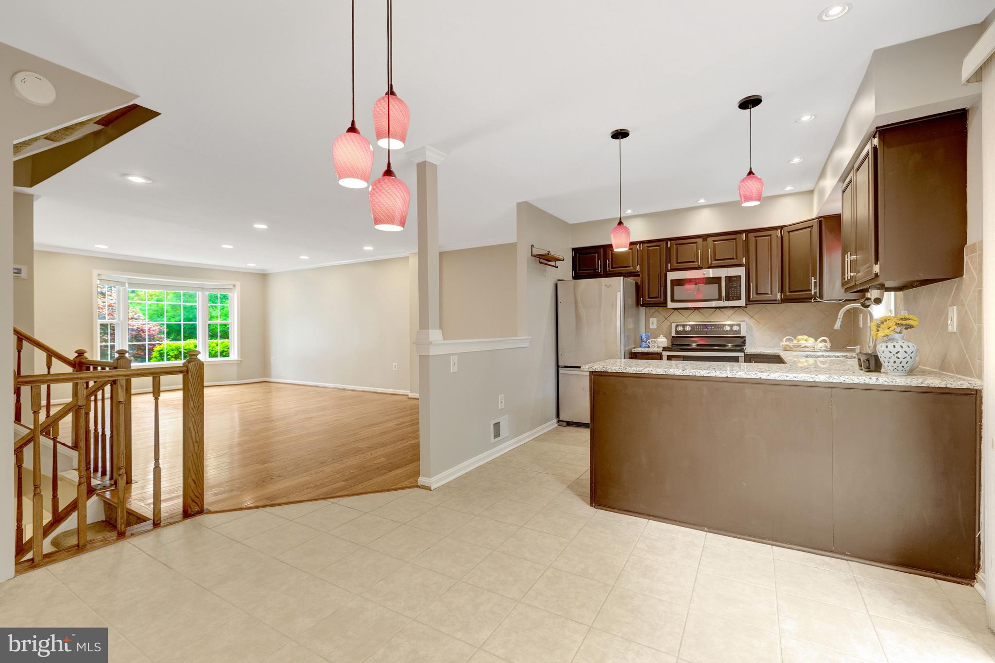 11992 Sentinel Point Court Reston, VA 20191 - Photo 15 of 49 Seamless flow to dining area