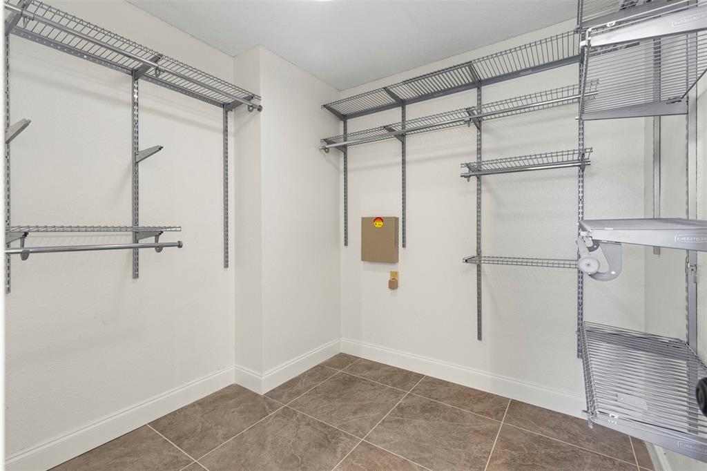 1500 Mission Ridge Trail Carrollton, TX 75007 - Photo 23 of 28 primary bedroom closet