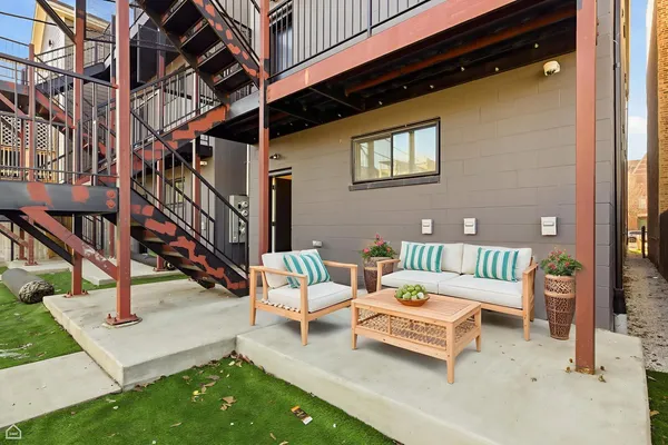 a building outdoor space with patio furniture