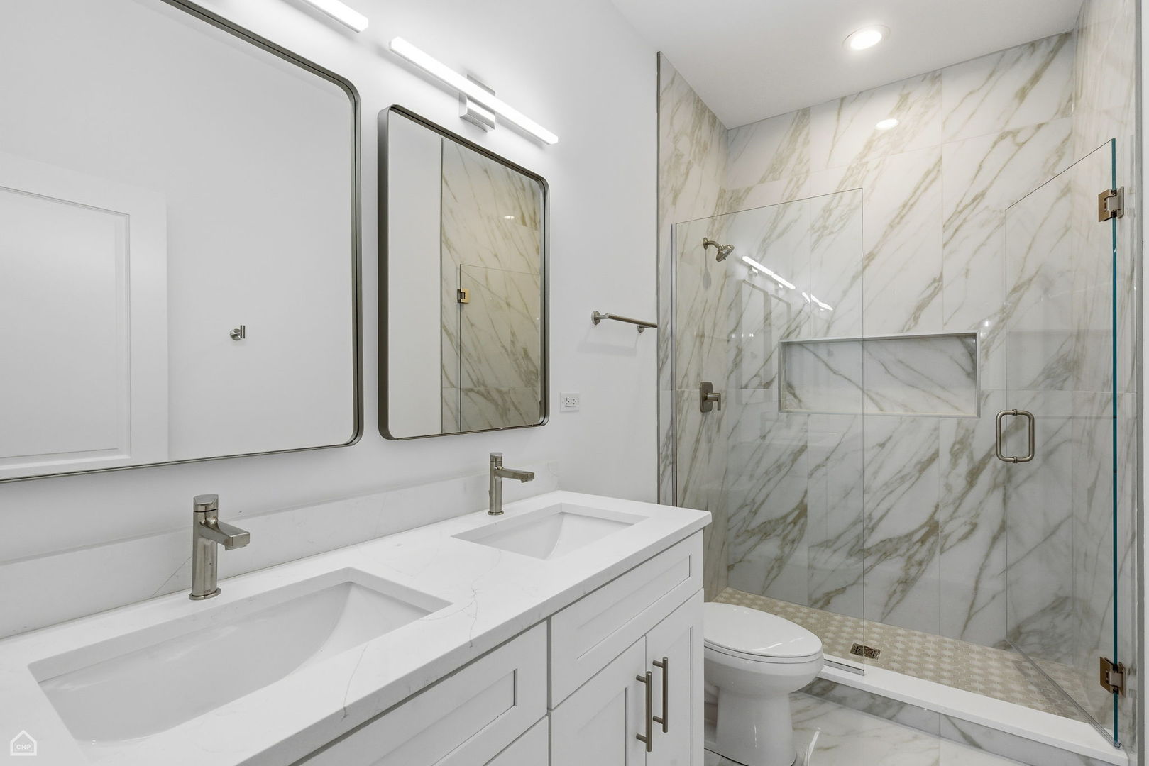 4739 South Indiana Avenue Chicago, IL 60615 - Photo 26 of 38 a bathroom with a sink toilet and shower