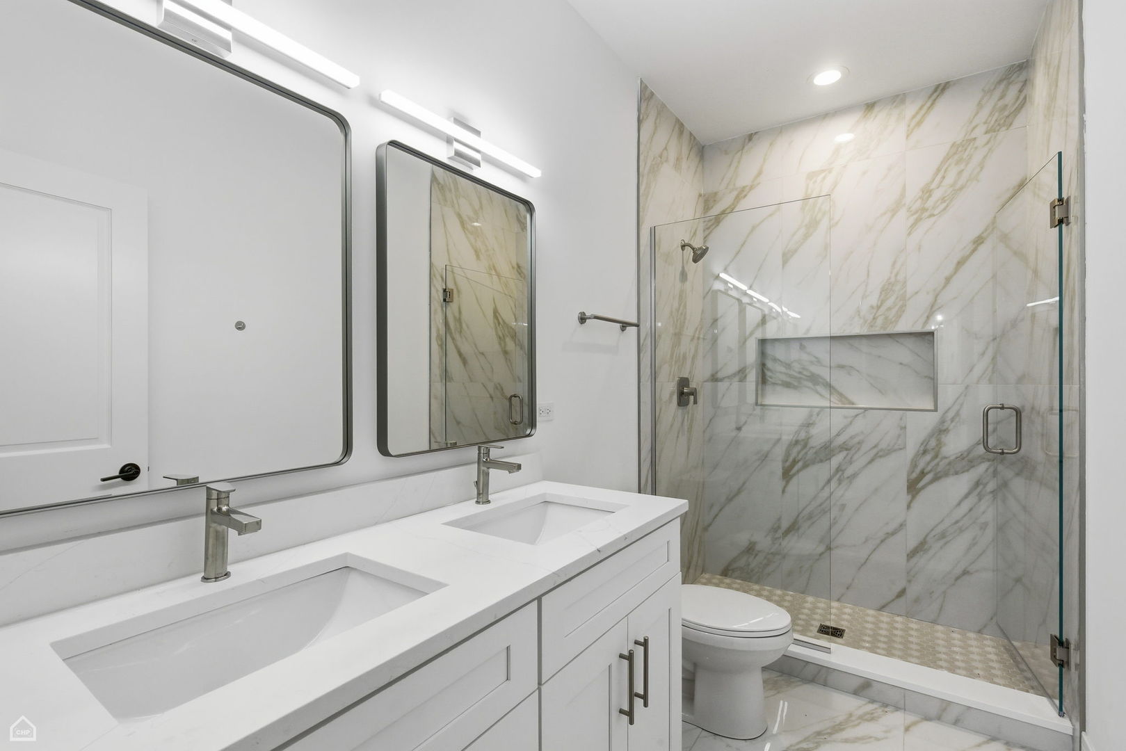 4739 South Indiana Avenue Chicago, IL 60615 - Photo 36 of 38 a bathroom with a sink toilet and shower
